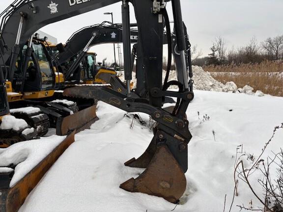 75 P TIER EXCAVATOR GEN A - Cab w/ AC; Rubber Pads; 18" Pads; Aux Hydraulics, Coupler, Hydraulic Thumb; 24" Bucket; w/ Blade