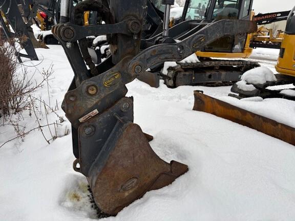 75 P TIER EXCAVATOR GEN A - Cab w/ AC; Rubber Pads; 18" Pads; Aux Hydraulics, Coupler, Hydraulic Thumb; 24" Bucket; w/ Blade
