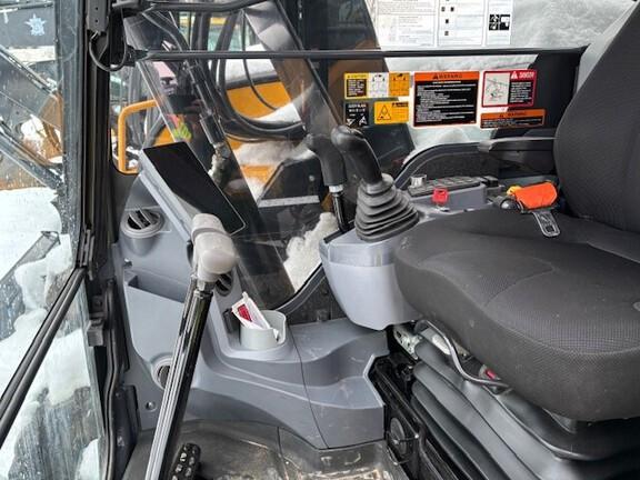 75 P TIER EXCAVATOR GEN A - Cab w/ AC; Rubber Pads; 18" Pads; Aux Hydraulics, Coupler, Hydraulic Thumb; 24" Bucket; w/ Blade
