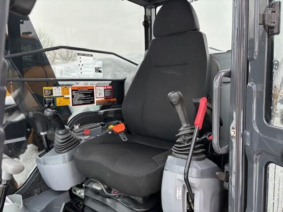 75 P TIER EXCAVATOR GEN A - Cab w/ AC; Rubber Pads; 18" Pads; Aux Hydraulics, Coupler, Hydraulic Thumb; 24" Bucket; w/ Blade