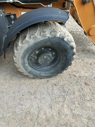 2023 CASE 580 SUPER N WT - Cab w/ AC, EH Joystick Controls, Pilot Controls; 4X4, Power Shift Trans; Extendible Dipper; Clamp, Forks, Thumb, Compactor; General Purpose Bkt; 19.5 Tires; Options: Aux Hydraulics