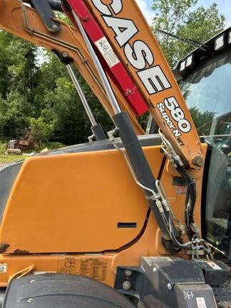2023 CASE 580 SUPER N WT - Cab w/ AC, EH Joystick Controls, Pilot Controls; 4X4, Power Shift Trans; Extendible Dipper; Clamp, Forks, Thumb, Compactor; General Purpose Bkt; 19.5 Tires; Options: Aux Hydraulics