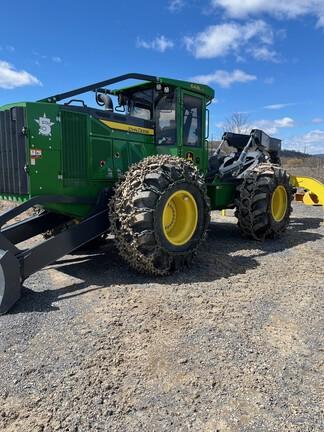 Cab w/ AC, Lever Steer; Super Wide Extreme Duty Axles (SWEDA); Winch, Dual Funct Grapple; Stacking Blade; 30.5 Tires