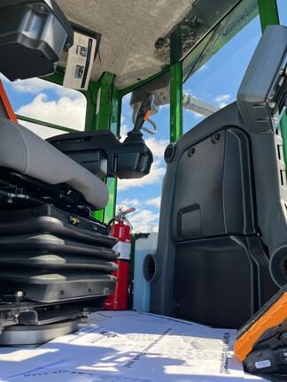 Cab w/ AC, Lever Steer; Super Wide Extreme Duty Axles (SWEDA); Winch, Dual Funct Grapple; Stacking Blade; 30.5 Tires