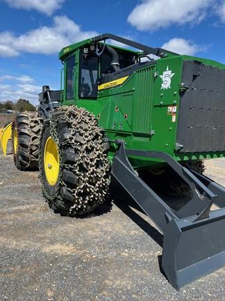 Cab w/ AC, Lever Steer; Super Wide Extreme Duty Axles (SWEDA); Winch, Dual Funct Grapple; Stacking Blade; 30.5 Tires