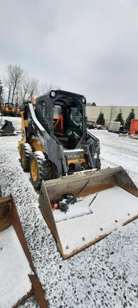 318G SKID STEER LOADER BASE - Cab w/ AC, EH Joystick Controls, Air Ride Seat; 2 Speed; Self-Leveling; Beefy Baby Tires; General Purpose Bkt
