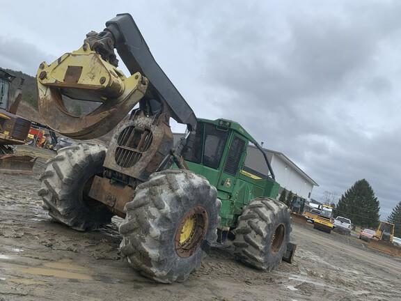 848L GRAPPLE SKIDDER - Cab w/ AC, Lever Steer; Dual Funct Grapple; Stacking Blade; 35.5 Tires