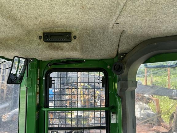 848L GRAPPLE SKIDDER - Cab w/ AC, Lever Steer; Dual Funct Grapple; Stacking Blade; 35.5 Tires