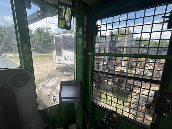 848L GRAPPLE SKIDDER - Cab w/ AC, Lever Steer; Dual Funct Grapple; Stacking Blade; 35.5 Tires