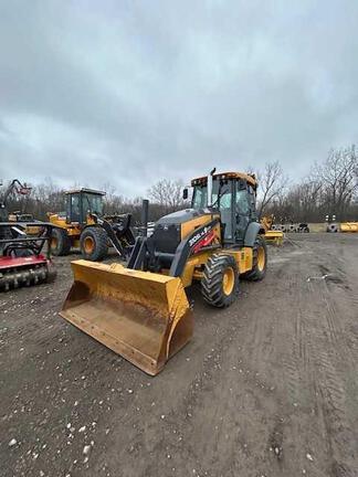John Deere 310HL BACKHOE LOADER, Cab w/ AC, Pilot Controls; 4X4, Ride Control; Extendible Dipper; Aux Hydraulics, Quick Coupler, Thumb; General Purpose Bkt, 24" Bucket; 17.5 Tires