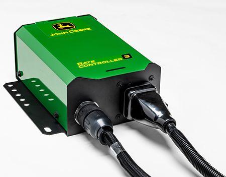 Implement harness connector attached to an adapter