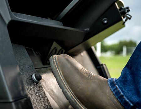 Standard equipment foot-operated horn button