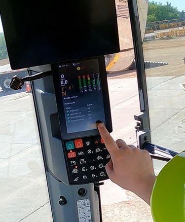 This customer is checking their machine health through the in-cab display