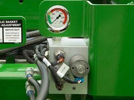 Hydraulic rolling basket down pressure valve