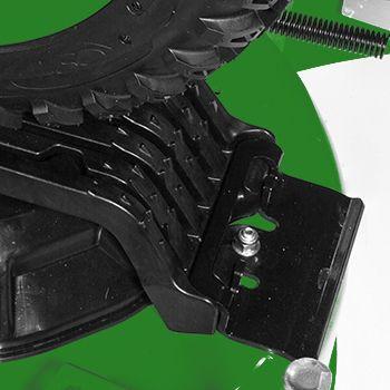 Tire-grab feature and shark tooth shaped grips