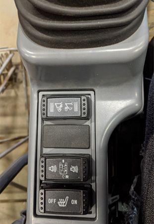 Coupler control switch on left side pilot tower