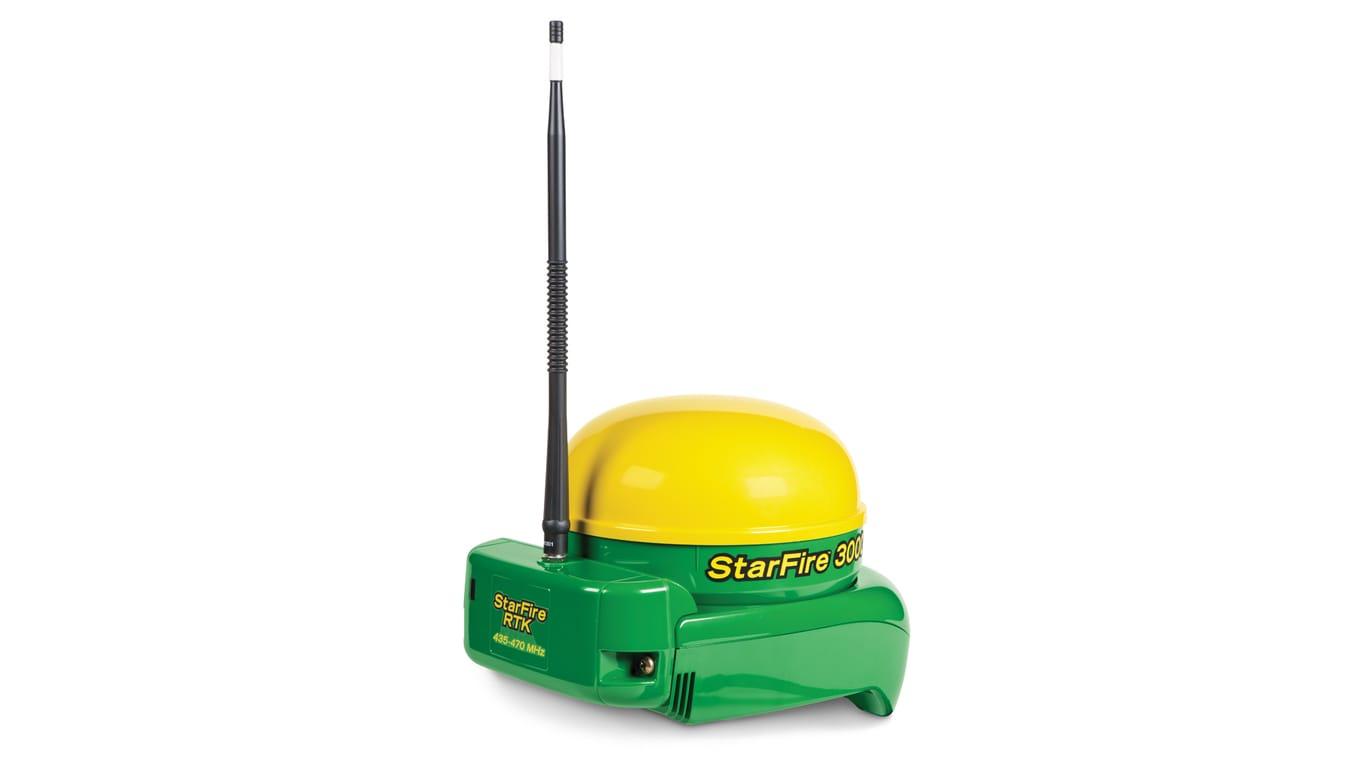 Green and yellow StarFire 3000 GPS receiver with an antenna.