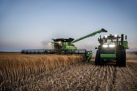 X9 Combine harvesting small grain