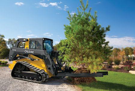 329E Compact Track Loader with NF44 Nursery Fork attachment