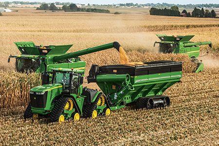 Filling the grain cart in the field