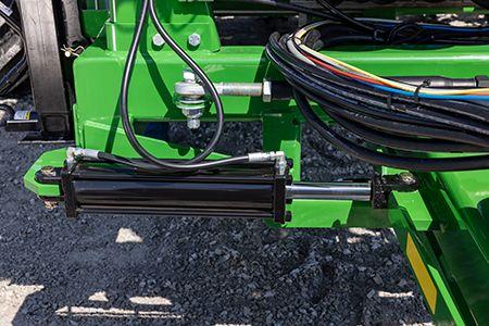 Hydraulic control on the front of the integrated steerable hitch