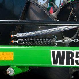 Dampening spring allows wheels to float