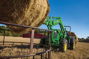 Moving hay bales