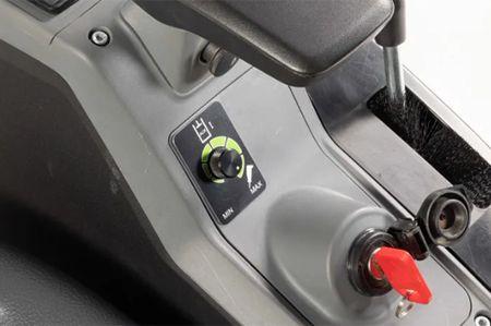 Knob under arm rest to adjust flow
