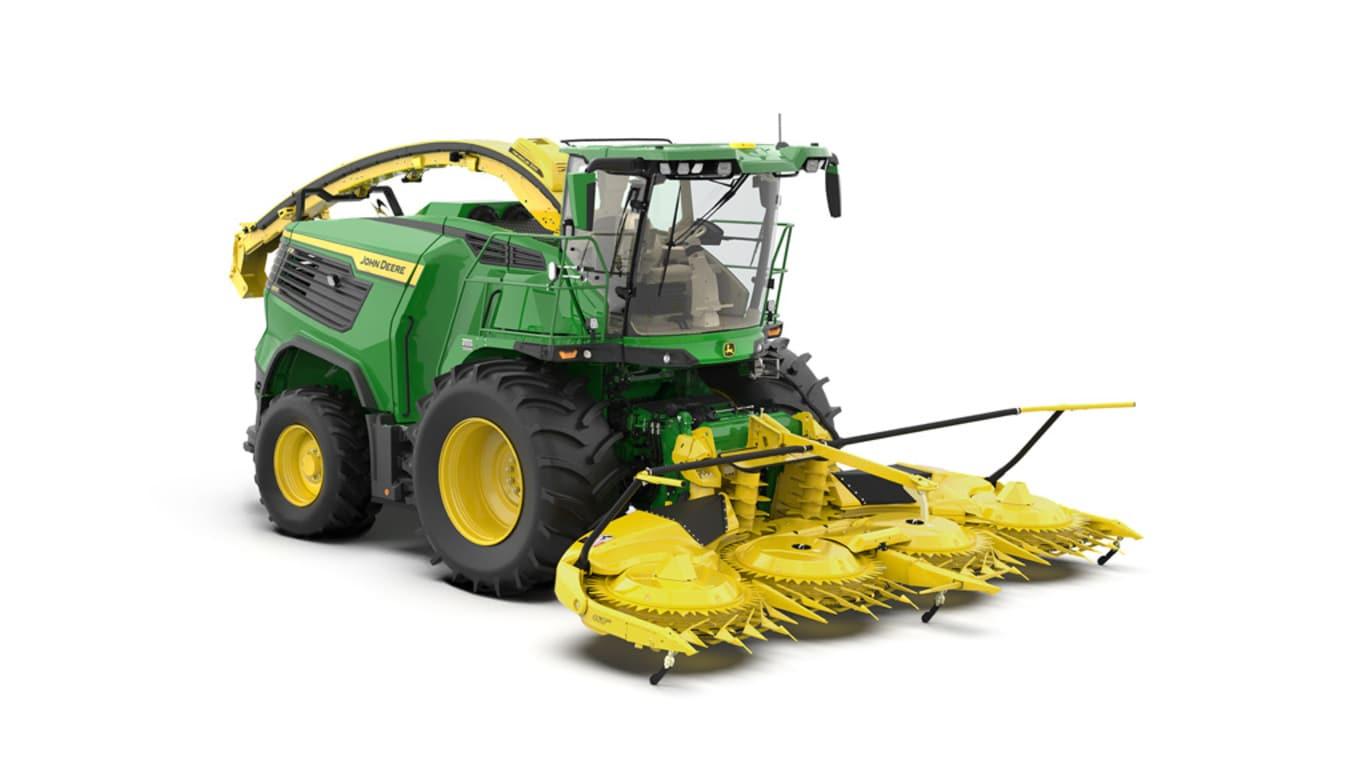 A front-right-facing green F8 500 self-propelled forage harvester with a yellow header on a white background.