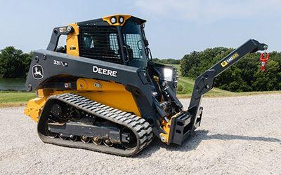 A 331 P-Tier compact track loader with an MB60 Material Boom attachment.