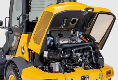 Hood tilted up at rear of the machine