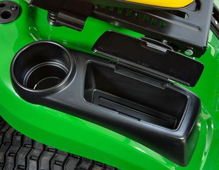 Beverage holder and covered storage compartment