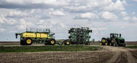 9RX 830 paired with the P680 Precision Hoe Drill and the C850T Air Cart