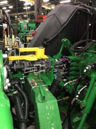 Brackets and U-bolts on planter for ExactRate valve