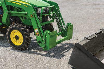 Skid steer carrier adapter