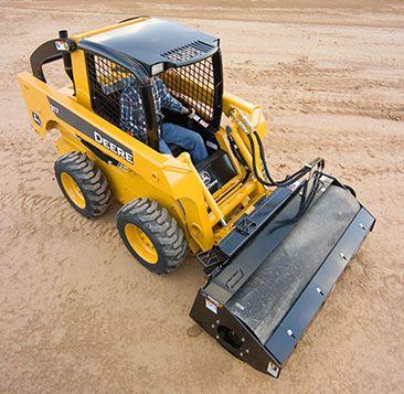 Vibratory roller with smooth drum