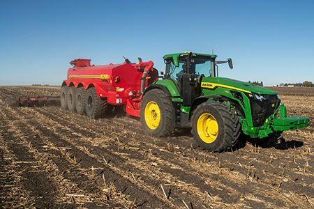 8R 540 with 14,000 gallon tanker