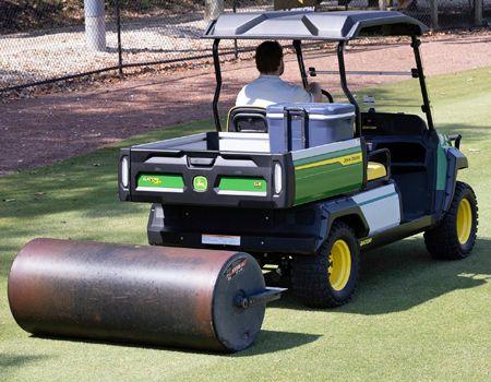GX Electric towing a lawn roller