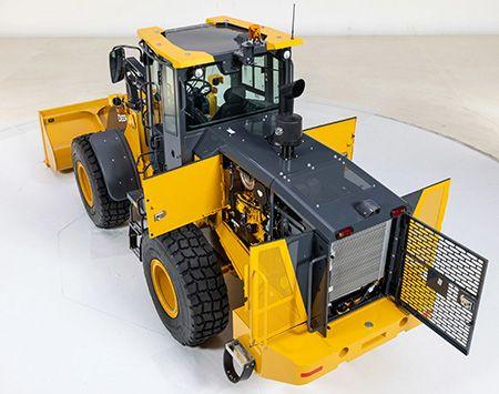 Hinged doors on both sides of the machine for ground-level access and service