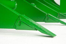 Replaceable wear tips increase implement wear life
