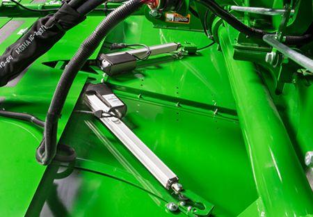 Windrow formation shield actuators