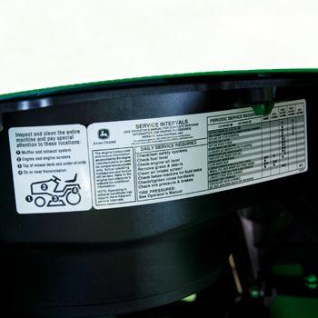 Service interval decal located under hood